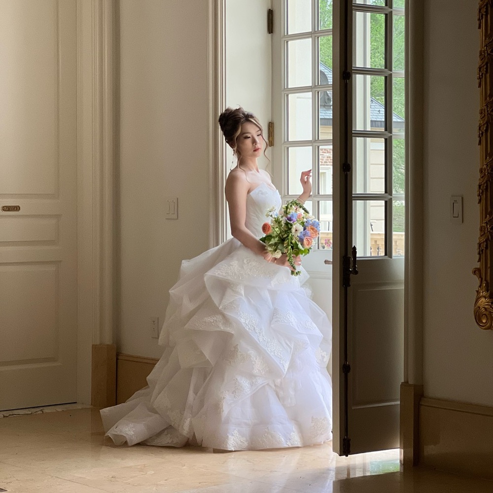 Vera Wang Katherine wedding dress with luxury lace details and Molly veil